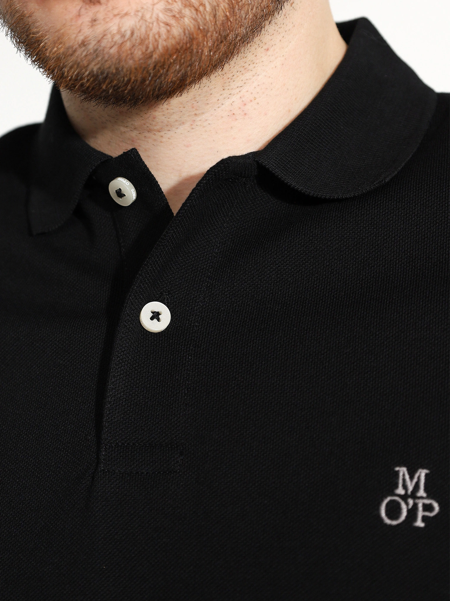 Поло черного цвета из хлопка